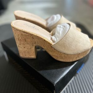 Women’s size 7.5 tan Charles heels